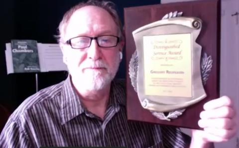 Gregory Redfearin with his award