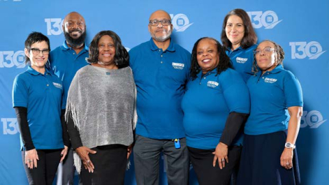 CTPF Board of Trustees Standing in front of a CTPF 130th Backdrop. Featuring Trustee Kurzydlo, Trustee Washington, Trustee Nelson, Former President Jeffery Blackwell, Current President Trustee Price Ward, Trustee Barajas, and Trustee Vinson