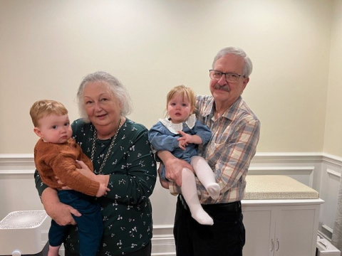 CTPF Retiree Joel Levin with his wife and grandchildren